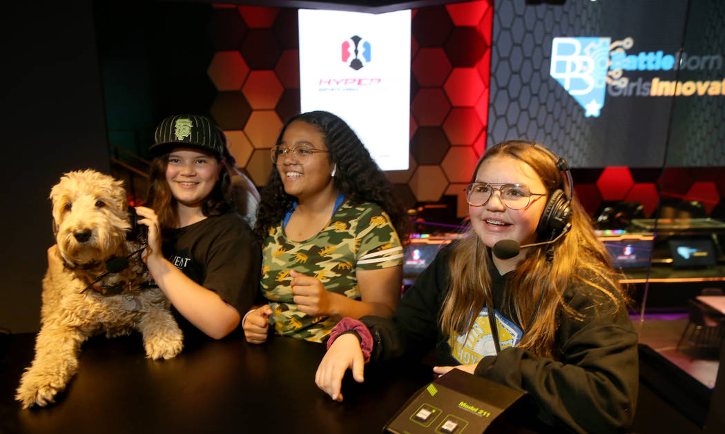 Eighth graders, from left, Sydney Ferguson, with her dog Fluffy, Jaelina Richardson and Rebeka ...