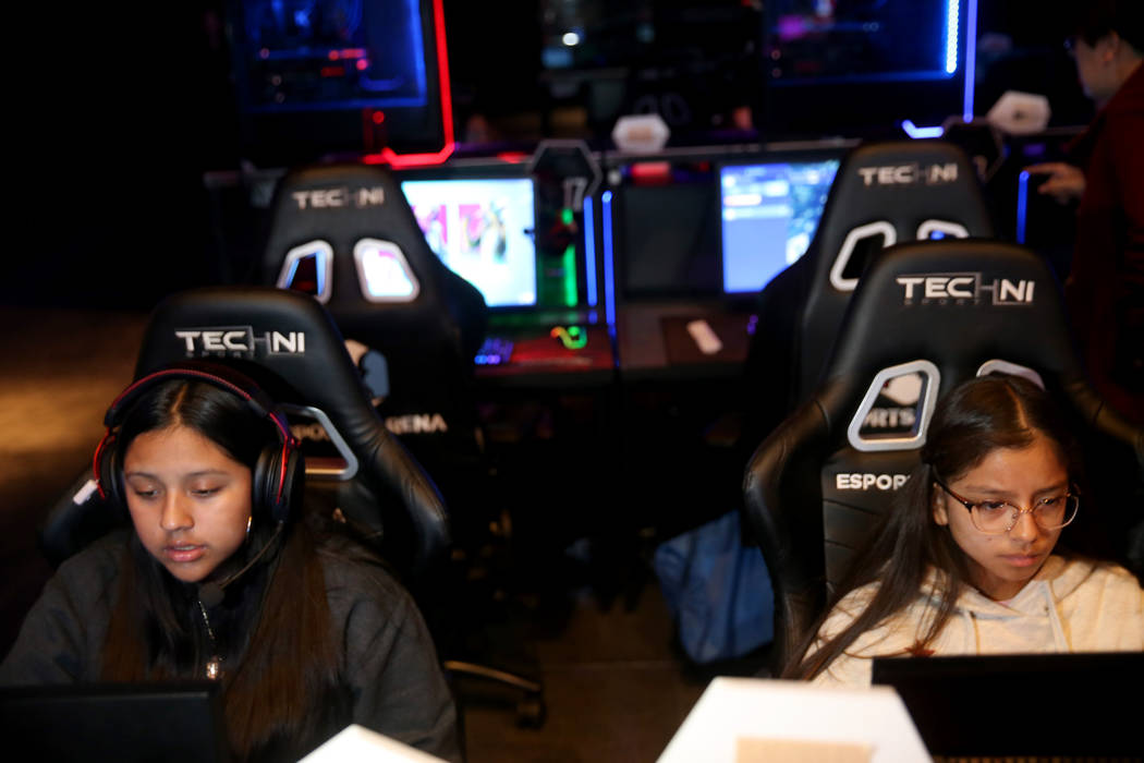 Eighth graders Yareli Martinez, 14, and Jimena Orozco, 13, play esports during Battle Born Girl ...