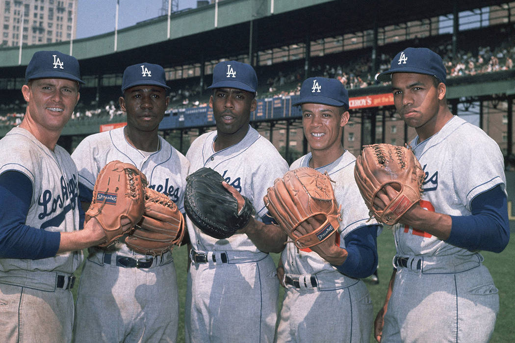 Los Angeles Dodgers infielders & catcher, from left, Ron Fairly, Jim Gilliam, Catcher John ...