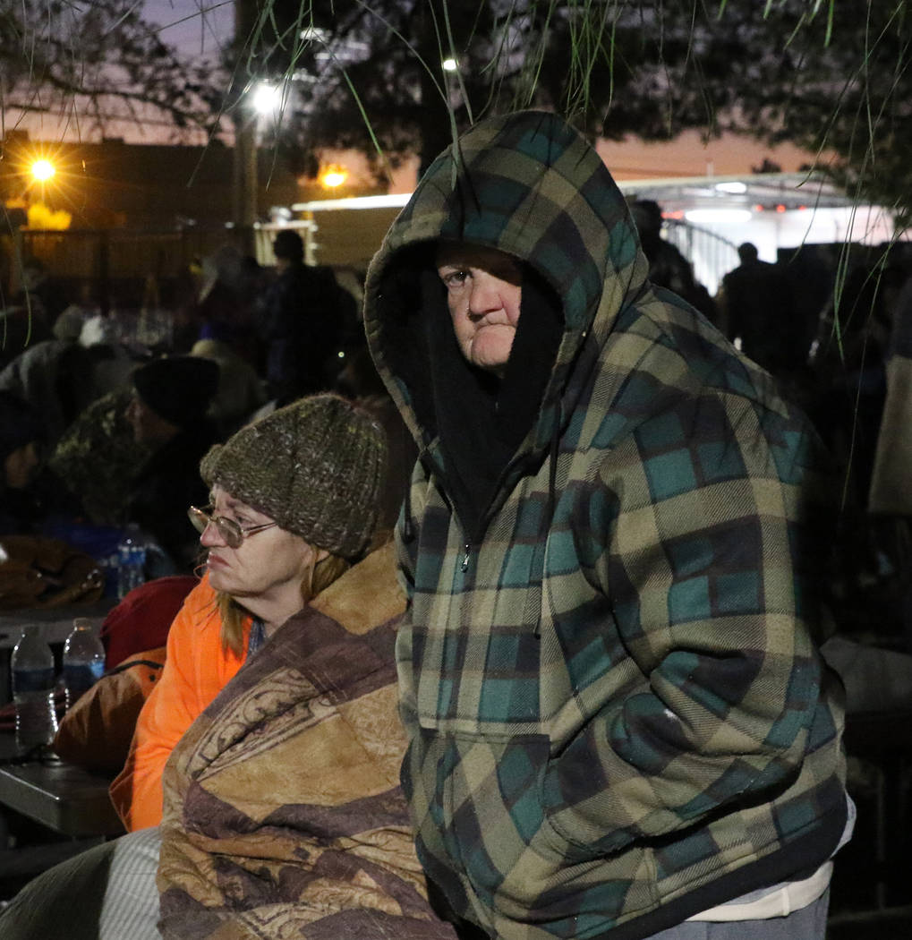 Clients, including Wanda Bradford, 77, try to keep warm at Courtyard Homeless Resource Center o ...