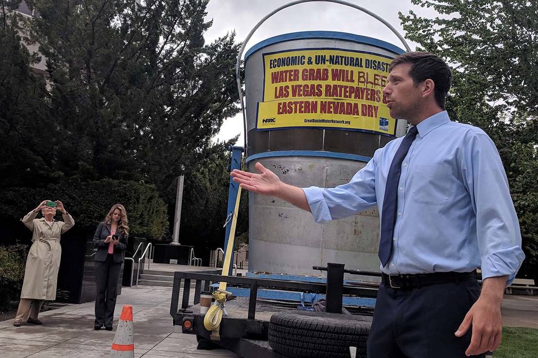 Kyle Roerink, executive director of Great Basin Water Network, speaks during a demonstration ou ...