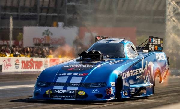 Funny car racer Matt Hagan takes the lead in the second round during the Dodge NHRA Nationals a ...