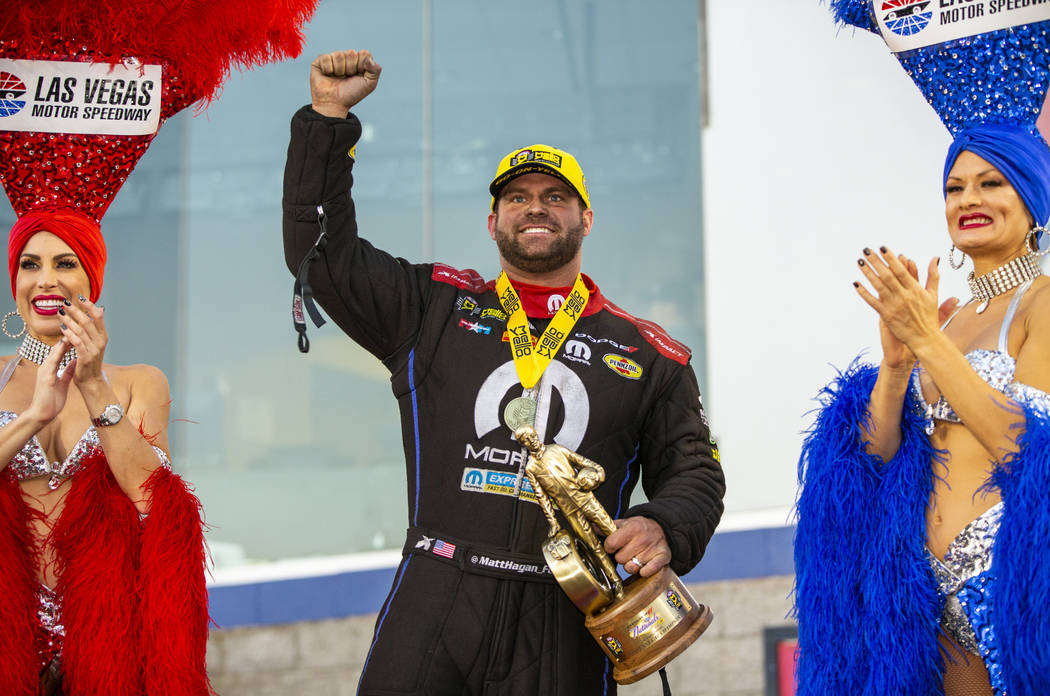Funny Car racer Matt Hagan celebrates his win in the final round of the Dodge NHRA Nationals at ...