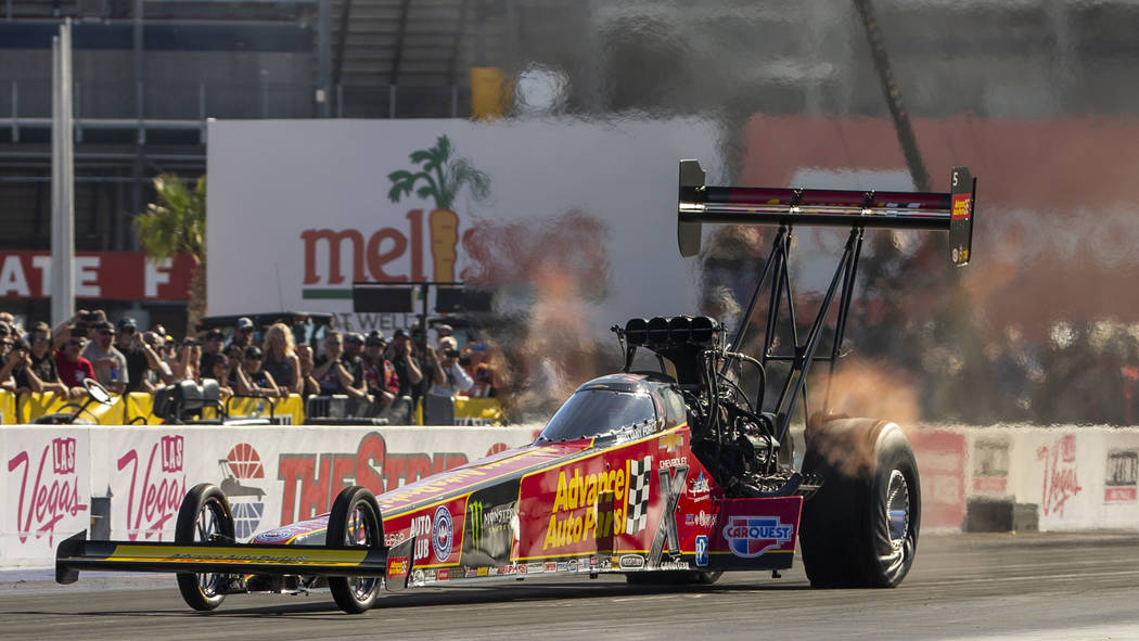 Top Fuel racer Brittany Force leads during the second round of the Dodge NHRA Nationals at the ...