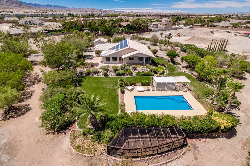 Luxury Estates International This 2.1-acre Las Vegas estate has parklike grounds, solar power a ...