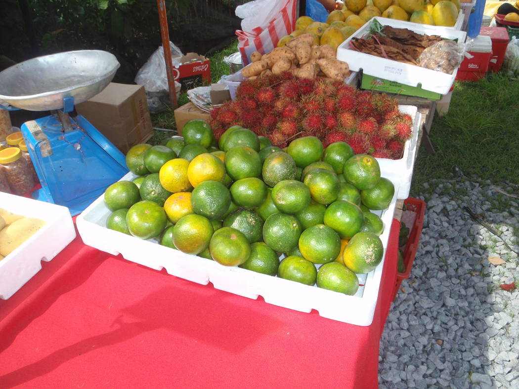 In the warm tropics, oranges stay green when they are ripe and sold that way in local markets. ...