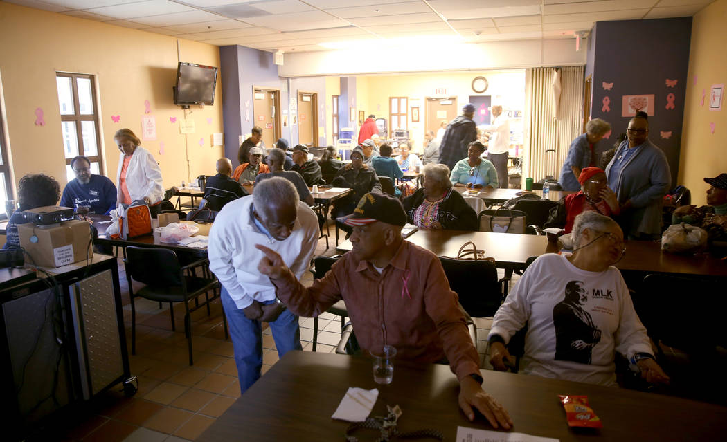 Seniors partake in a variety of activities in the multipurpose room, including movie-watching, ...