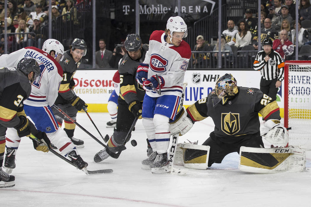 Vegas Golden Knights goaltender Marc-Andre Fleury (29) makes a save in traffic against Montreal ...