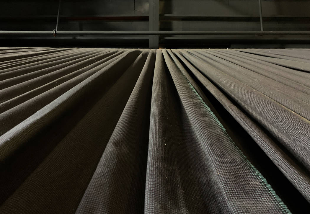 Dust covered soundproof curtains line the walls inside the historic Huntridge Theater on Thursd ...