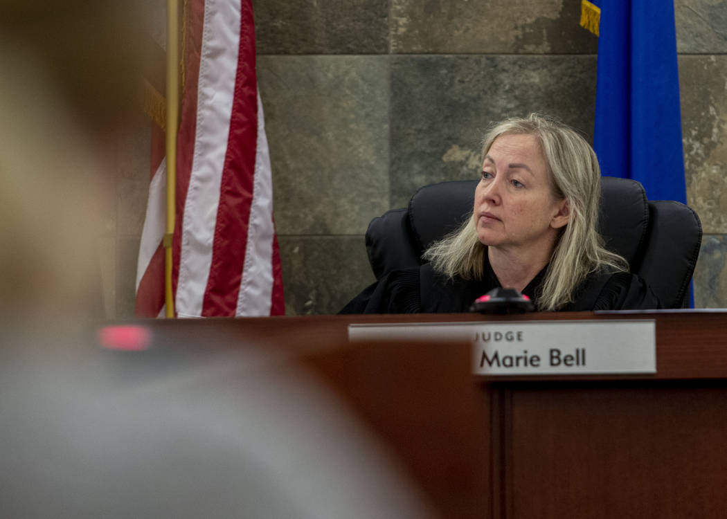 Judge Linda Marie Bell listens to prosecutor Michael Schwartzer during a hearing for several ne ...