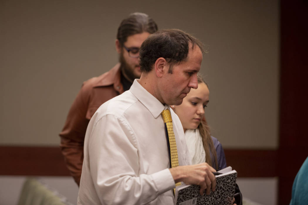 Paula Davis' family, father Sean Davis, front, sister Rachel Davis, middle, and cousin James Mi ...