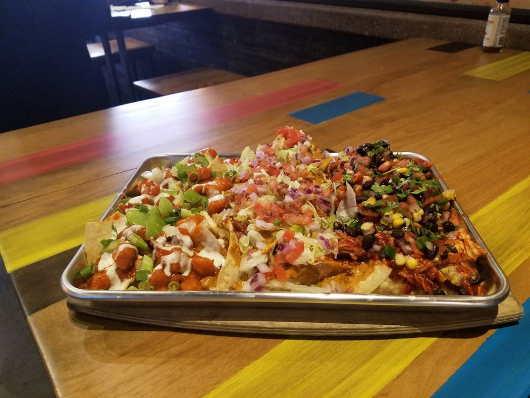 The North of the Border flight at Nacho Daddy has Buffalo Hot Nachos, Nacho Average Burger Nach ...