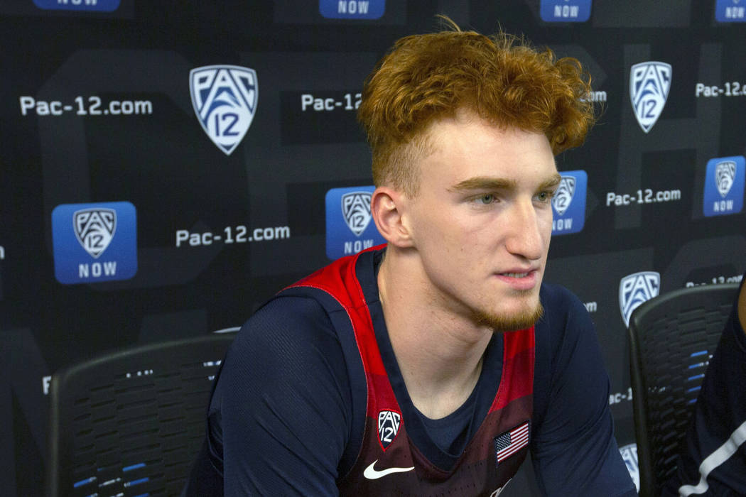 Arizona's Nico Mannion speaks at the Pac-12 NCAA college basketball media day in San Francisco ...