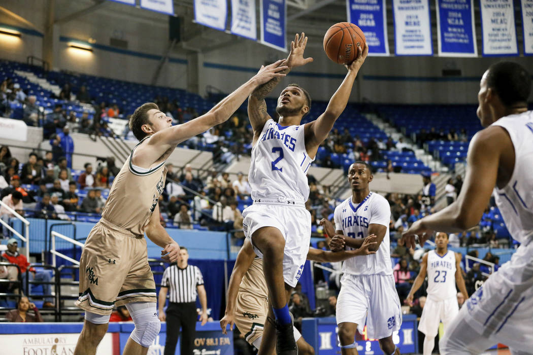 Hampton's Jermaine Marrow (2) looks for a shot against William & Mary during an NCAA college ba ...