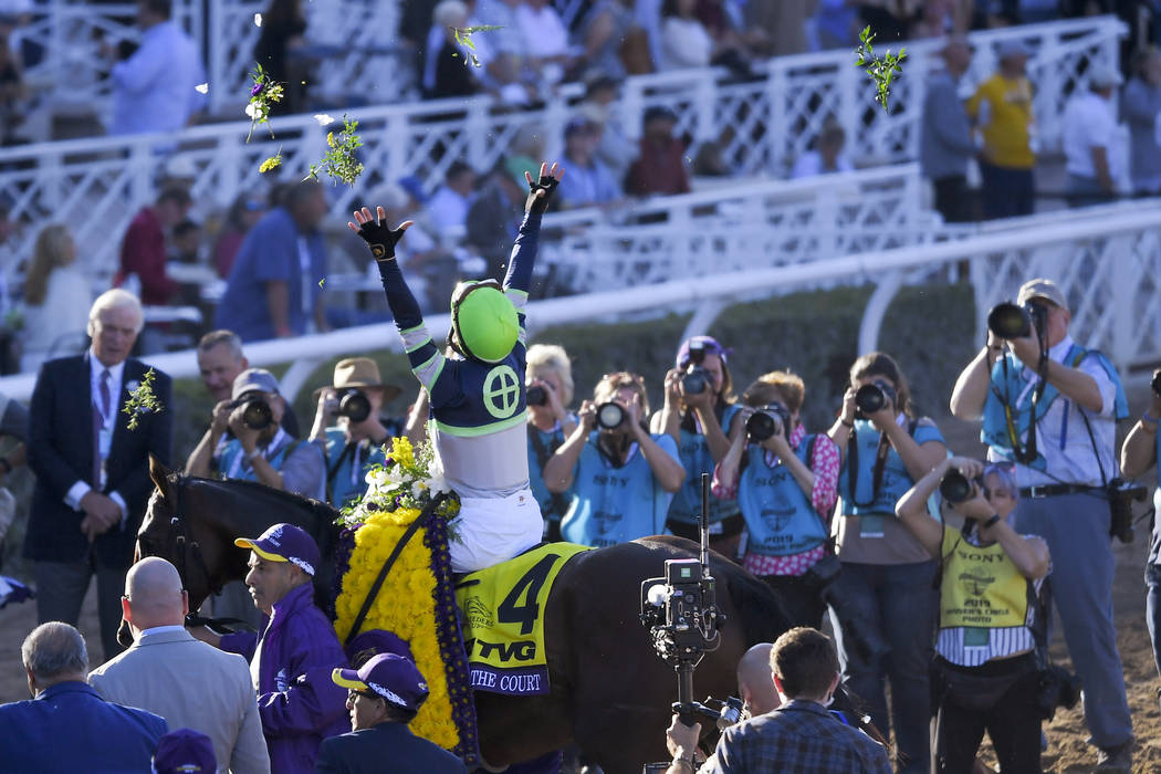 Flavien Prat celebrates after Storm the Court won the Breeders' Cup Juvenile horse race at Sant ...