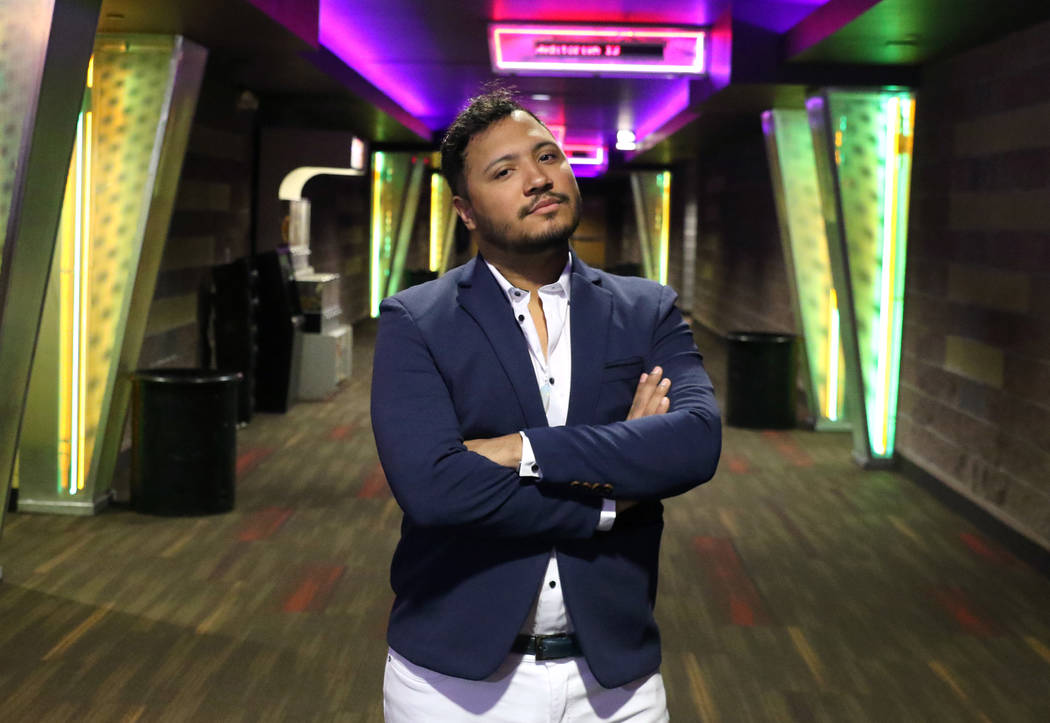 Kris Manzano, founder and director of the Las Vegas Queer Arts Film Festival, poses for a photo ...