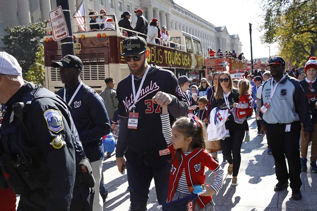 Washington Nationals starting pitcher Stephen Strasburg (37) arrives for a parade to celebrate ...