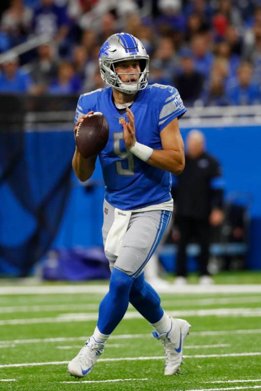 Detroit Lions quarterback Matthew Stafford throws against the New York Giants during an NFL foo ...