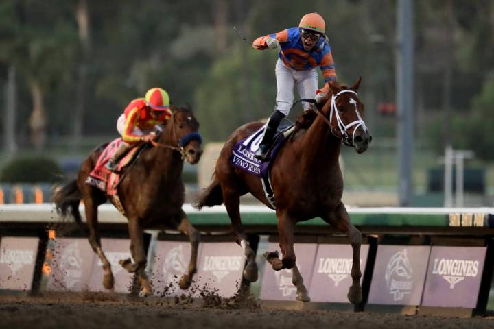 Irad Ortiz Jr. aborad Vino Rosso celebrates after the Breeders' Cup Classic horse race at Santa ...