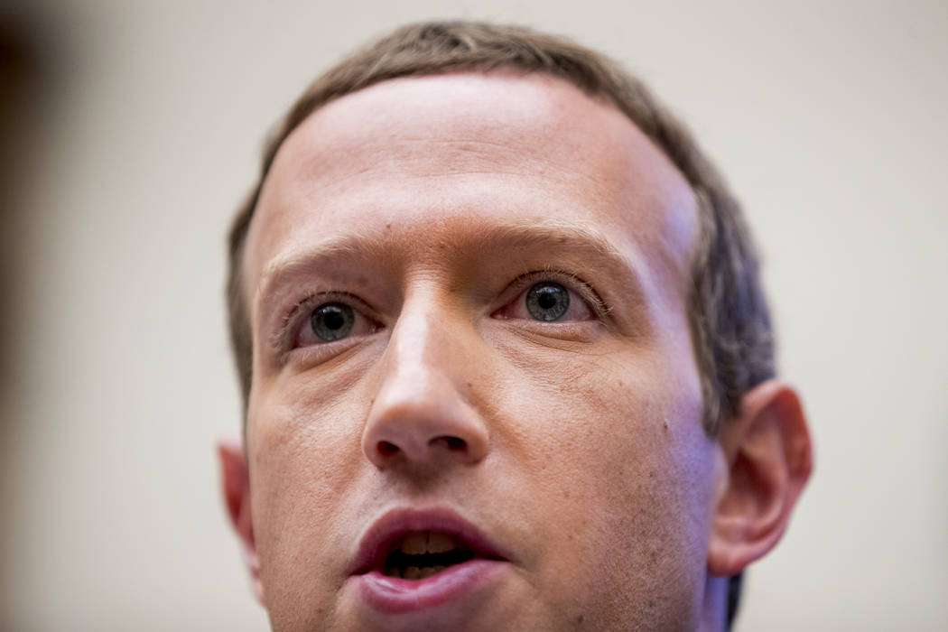 Facebook CEO Mark Zuckerberg testifies before a House Financial Services Committee hearing on C ...