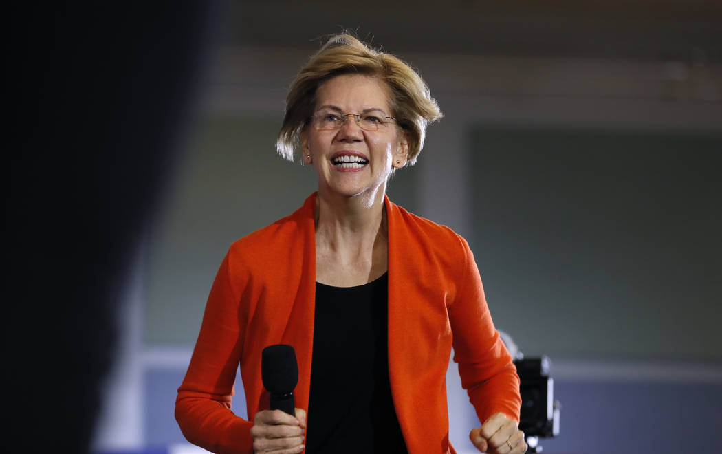 Democratic presidential candidate Sen. Elizabeth Warren arrives to speak at a town hall meeting ...