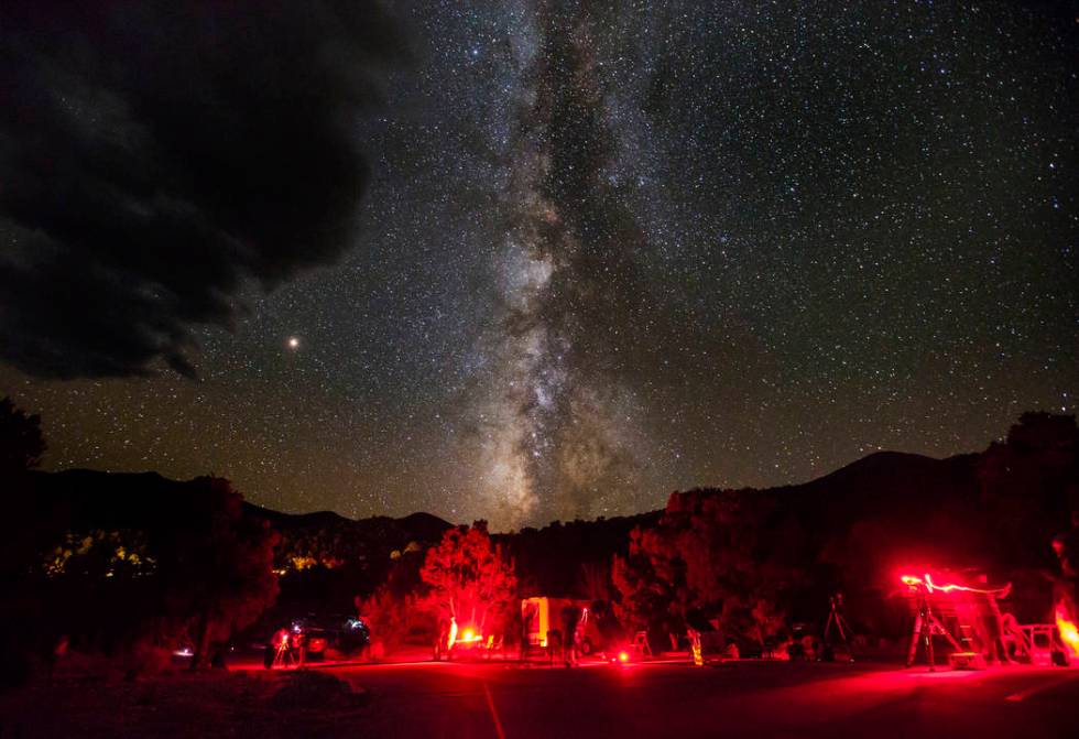The Milky Way galaxy, along with Mars, center left, shines above Great Basin National Park duri ...