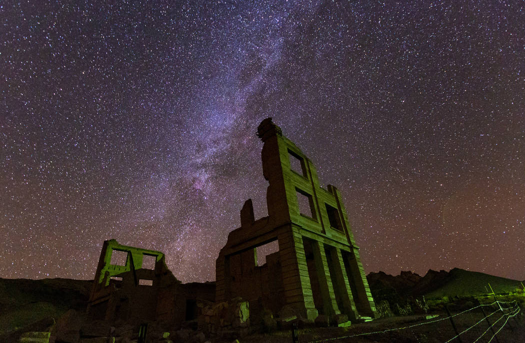 A view of the night sky over the Cook Bank building in Rhyolite on Friday, Nov. 22, 2019. (Chas ...