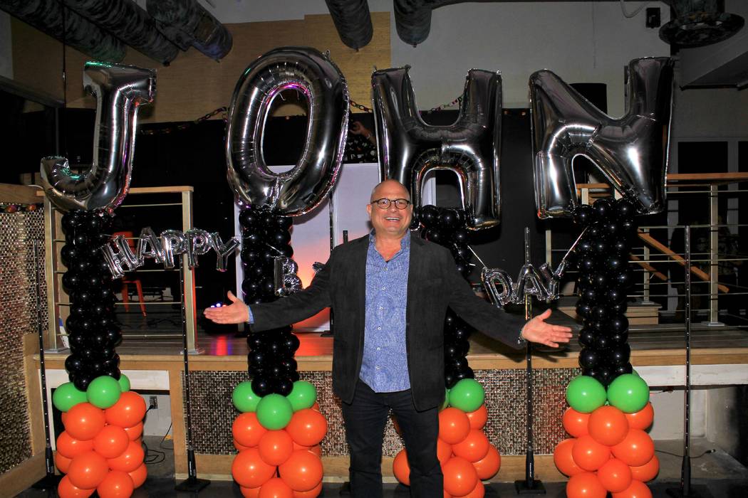 Las Vegas comic impressionist John Di Domenico is shown at his surprise 57th birthday party at ...