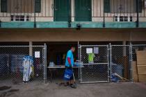 Harlan Thompson goes about his duties at the Courtyard Homeless Resource Center in Las Vegas, T ...