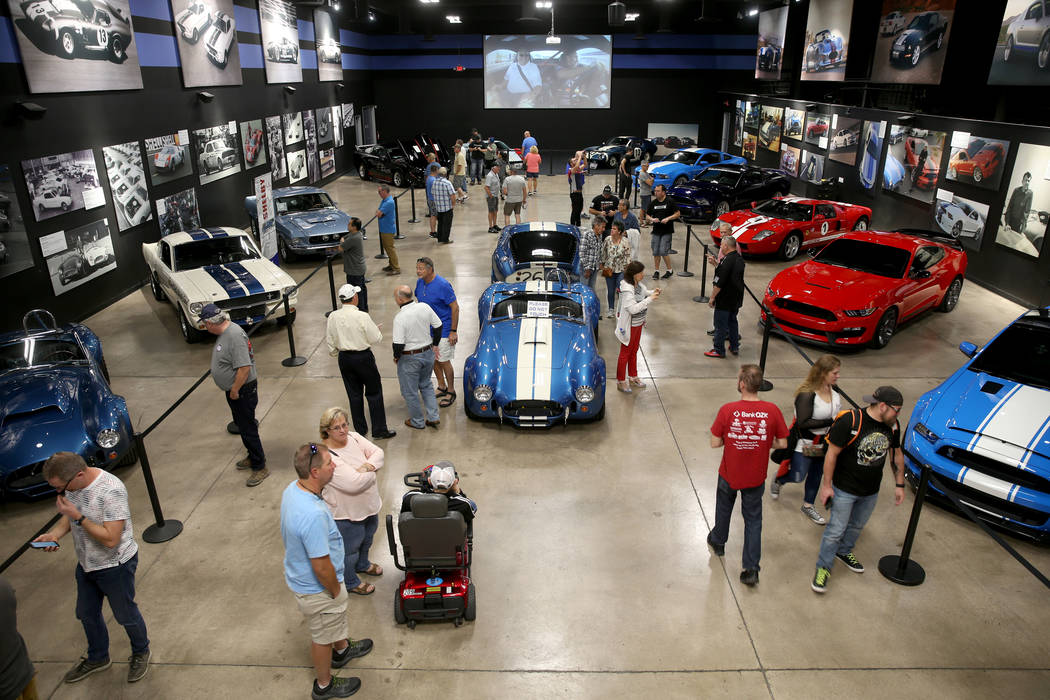 Guests check out the Shelby Heritage Center in Las Vegas Monday, Nov. 4, 2019. Car racing and c ...