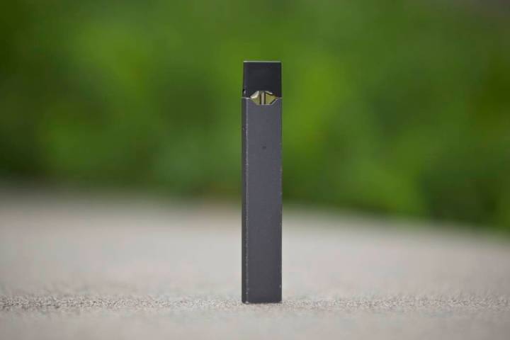 An April 16, 2019, file photo, shows a Juul vape pen in Vancouver, Wash. New research released ...