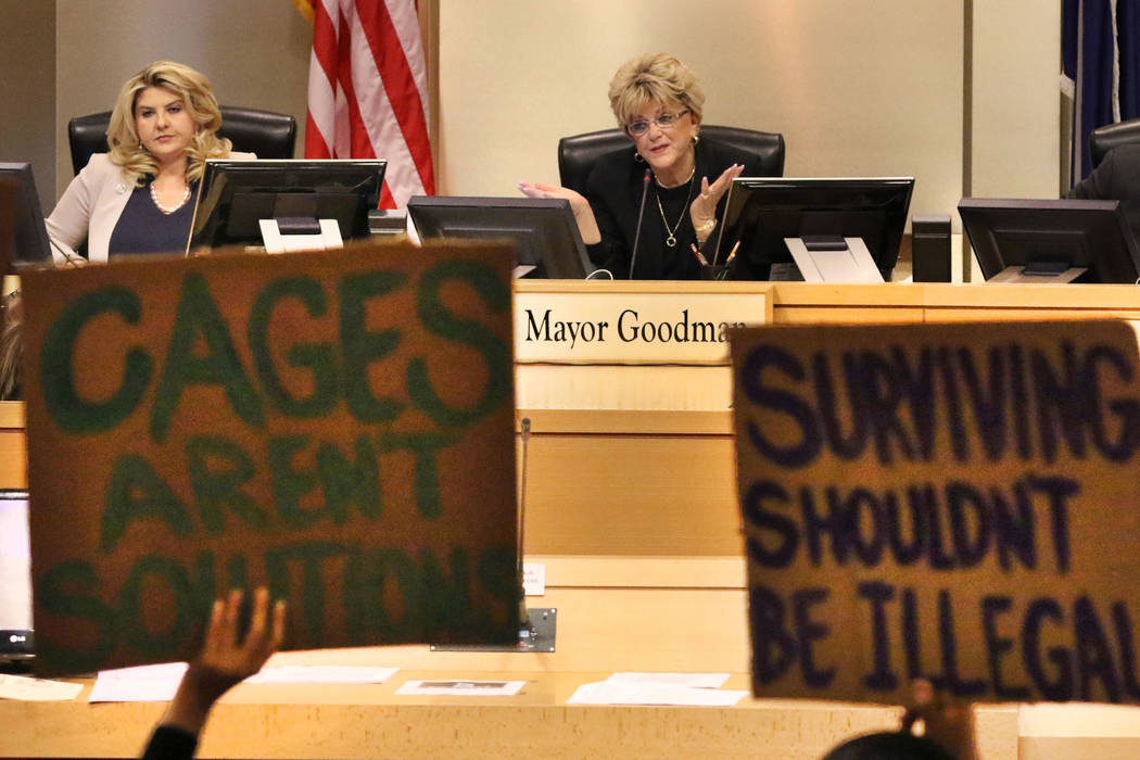 Councilwoman Michele Fiore, left, listens as Las Vegas Mayor Carolyn Goodman speaks during the ...