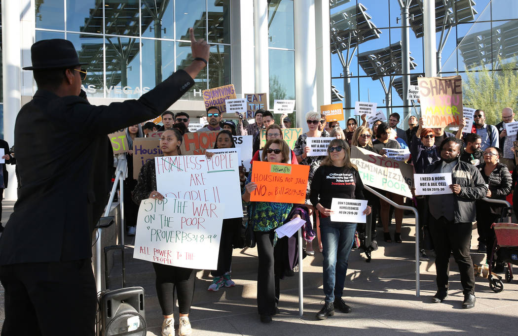Minister Stretch Sanders speaks outside Las Vegas City Hall during a protest against the city c ...