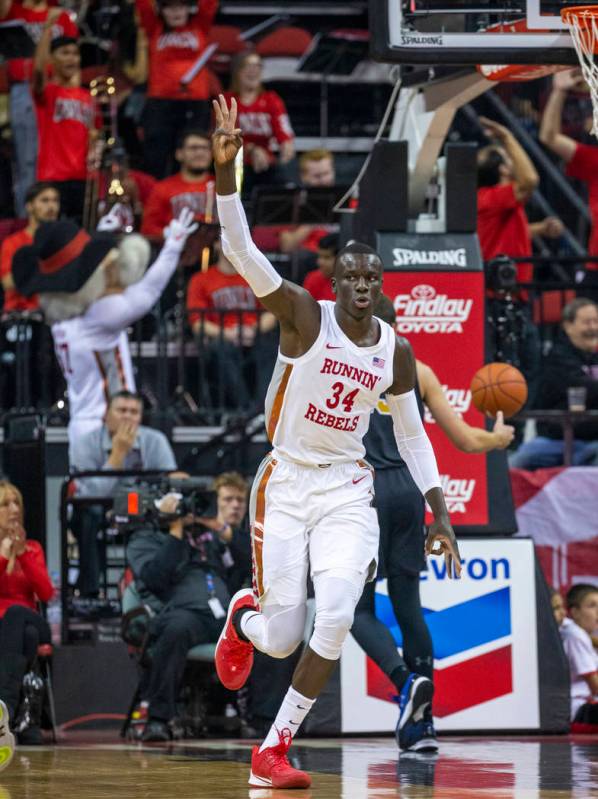 UNLV Rebels forward Cheikh Mbacke Diong (34) celebrates a dunk over Purdue Fort Wayne during th ...