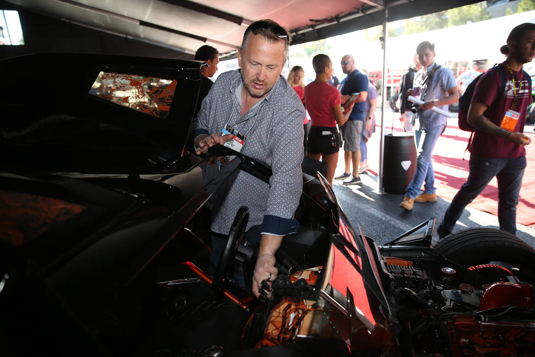 Las Vegas resident Ronn Moon shows his Marvel Comics themed custom Polaris Slingshot on display ...