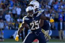 Los Angeles Chargers running back Melvin Gordon celebrates after scoring against the Green Bay ...