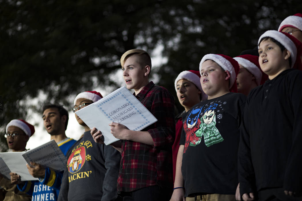 Members of the Coronado High School choir and the Schofield Middle School choir sing at the 26t ...