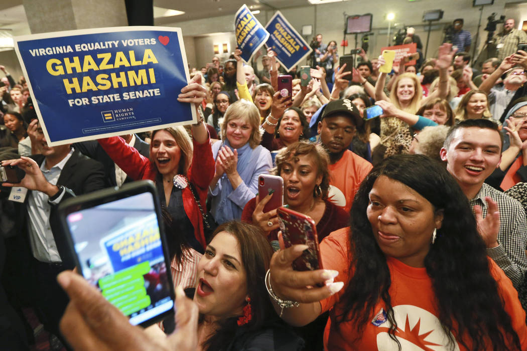 Democratic supporters cheer at their party in Richmond, Va., Tuesday, Nov. 5, 2019. All seats i ...