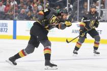 Golden Knights defenseman Nicolas Hague (14) shoots on goal during the first period of Vegas' N ...