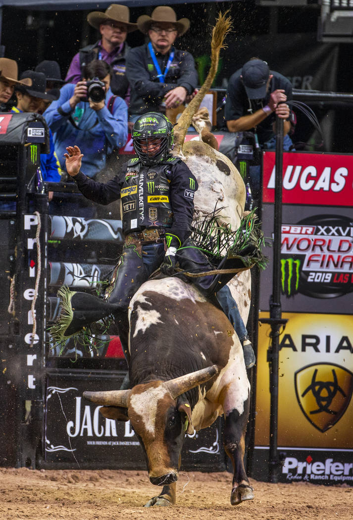 Chase Outlaw sits back atop of Foghorn Leghorn during the PBR World Finals at T-Mobile Arena on ...