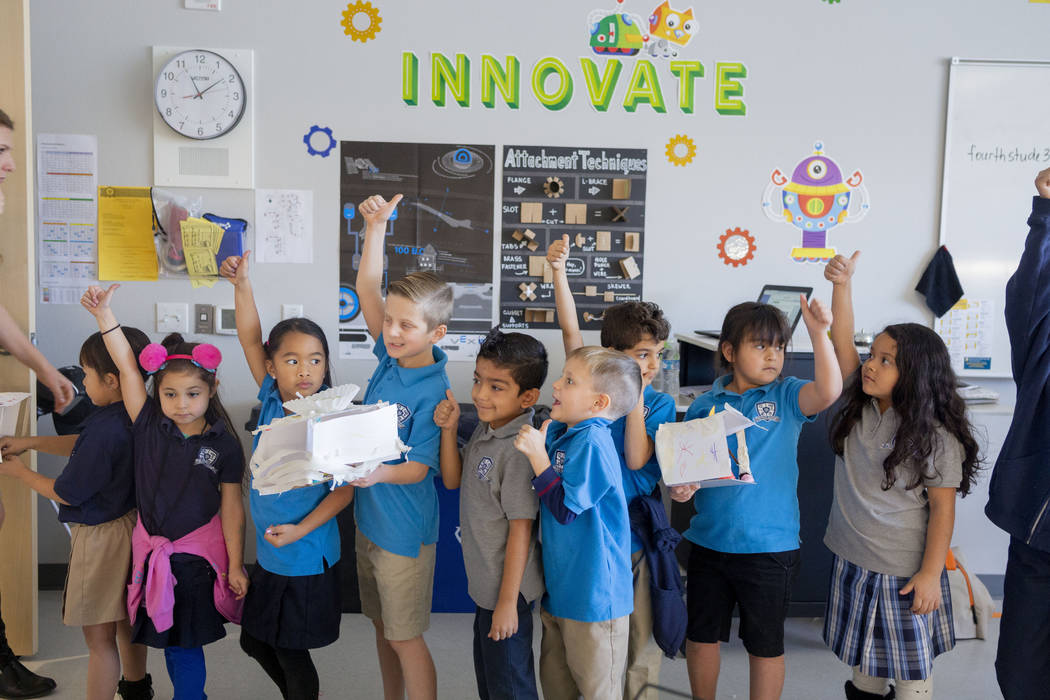 Second grade students wait in line to go test out their STEM projects at Pinecrest Academy, Nev ...