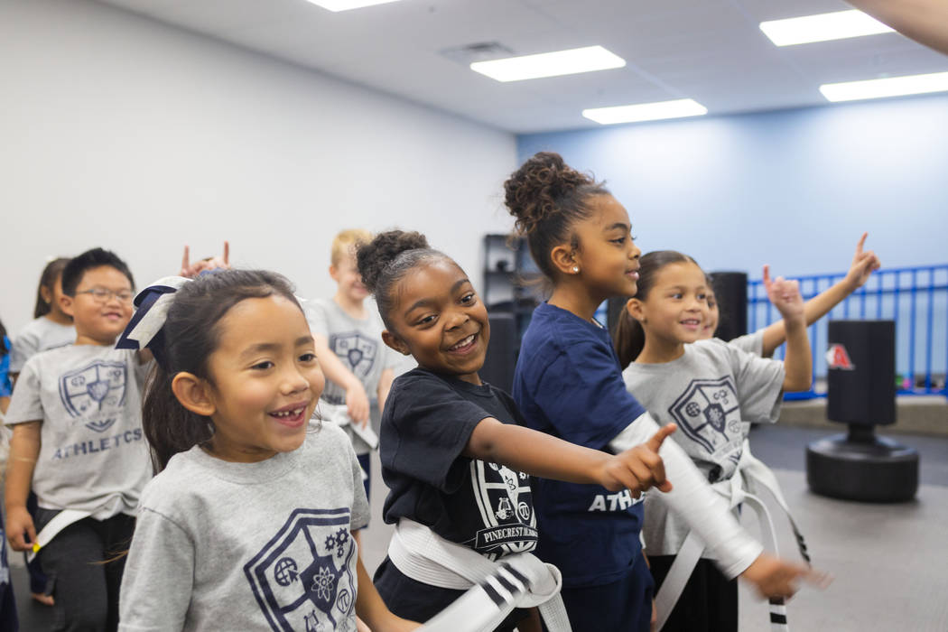 Second graders participate in their martial arts class at Pinecrest Academy, Nevada's newest ca ...