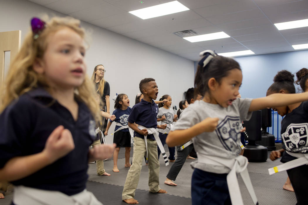 Second graders participate in their martial arts class at Pinecrest Academy, Nevada's newest ca ...