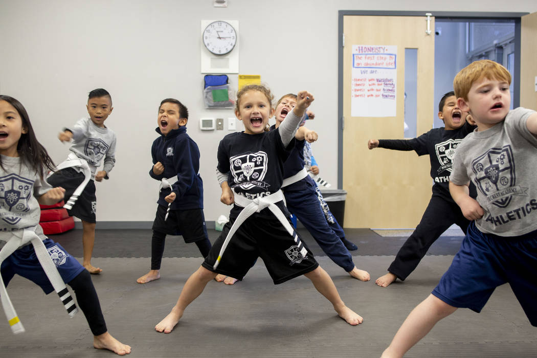 Second graders participate in their martial arts class at Pinecrest Academy, Nevada's newest ca ...