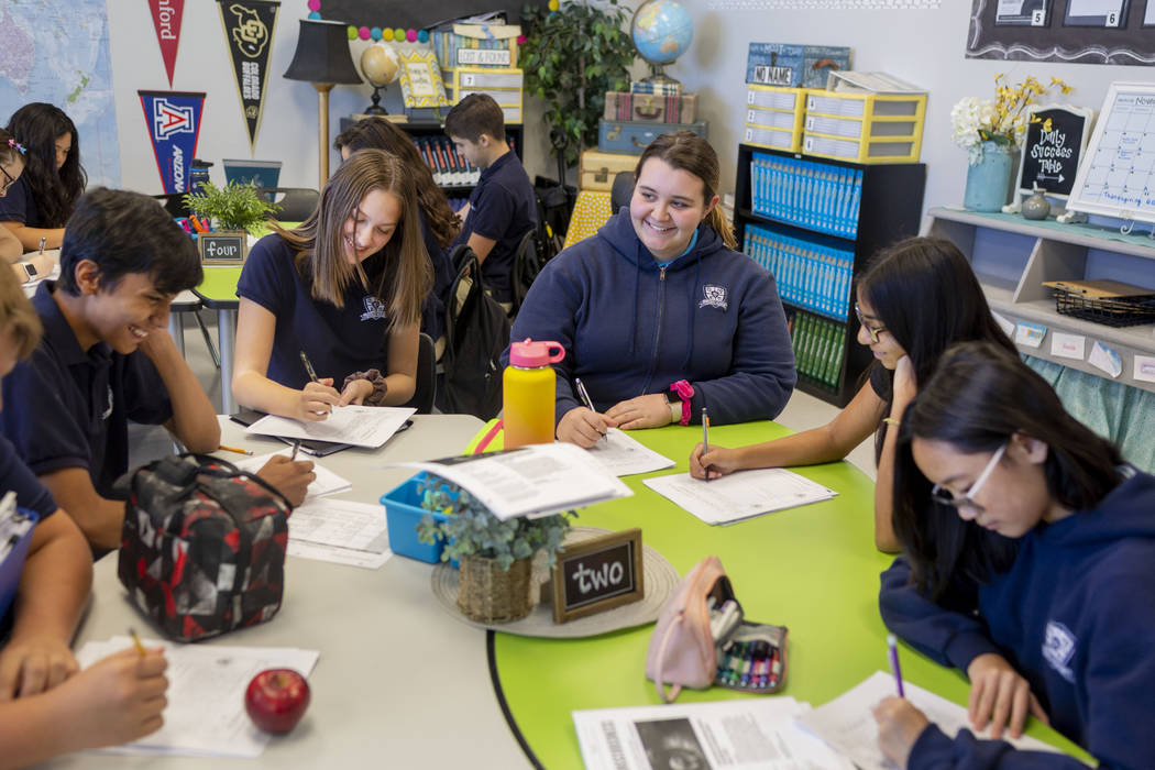 Ninth grade students participate in a stream of consciousness writing exercise for their AP psy ...