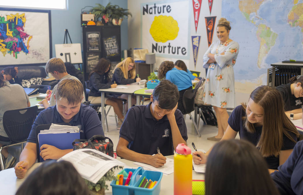 Ninth grade students participate in a stream of consciousness writing exercise for their AP psy ...