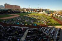 Fans relax on the field and in the stands during the first Vegas Golden Knights watch party as ...