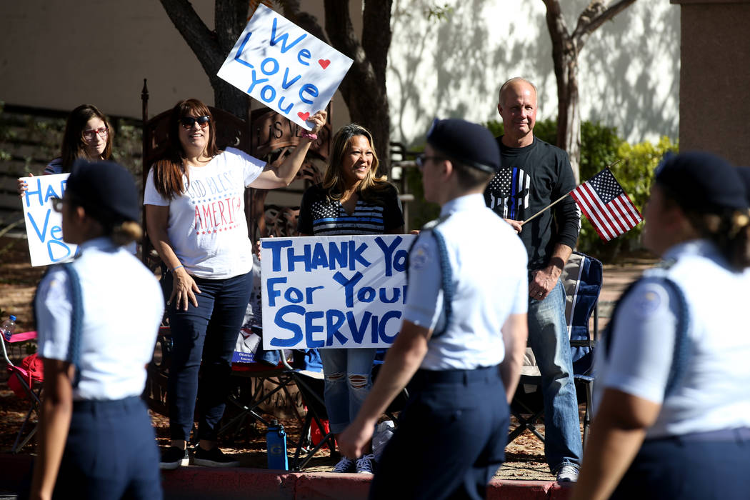 Makayla Thomas, 12, Kim Thomas, 54, Benjawan Shoemaker, 48, and Edward Shoemaker, 57, watch the ...