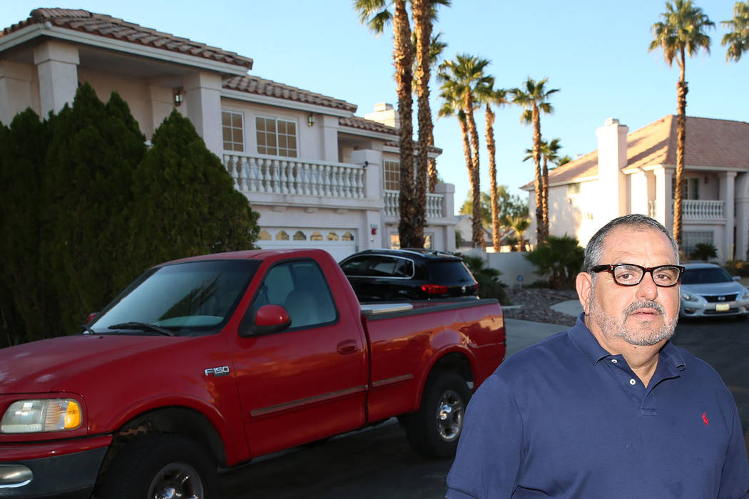 Victor Padron stands in front of his home in Las Vegas, Thursday, Nov. 7, 2019. Padron is conc ...