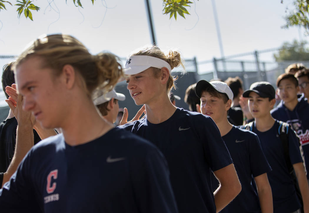 Coronado's Jason Elliott, second from left, lines up with his teammates to congratulate Palo Ve ...